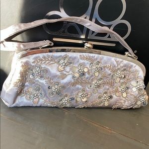 Silver glittery clutch